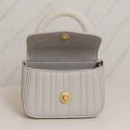 Ivory Elegance Quilted Handbag